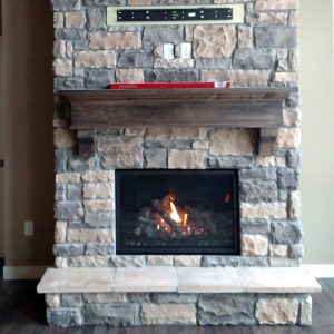 fireplace built into brick mantel